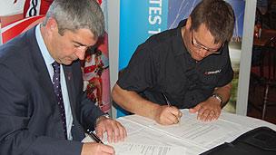 Stephen Castle and Dan Proulx sign the Memorandum of Understanding