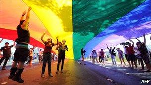 People take part in the 2nd Gay Parade Against Homophobia in Brasilia on 18 May 2011