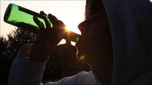 Teenager drinking beer