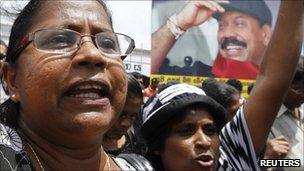 Demonstrators march against Monday's attack by the police on trade unionists