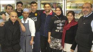 Abdul Arain (far right) with staff at his Cambridge delicatessen