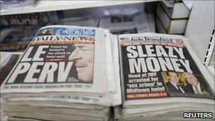Front pages of the New York Daily News and the New York Post headlined "Sleazy money" and "Le Perv"
