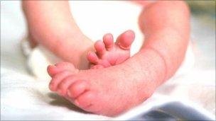 Feet of newborn baby