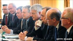 Members of the Joint Ministerial Committee attend a meeting chaired by Prime Minister David Cameron at 10 Downing Street