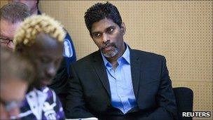 Singaporean Wilson Maj Perumal (centre) at Lapland district court on 9 June 2011