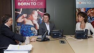 Bill Gates (left), with Save the Children Chief Executive Justin Forsyth and Natasha Kaplinsky. (Copyright: Terri Pengilley)