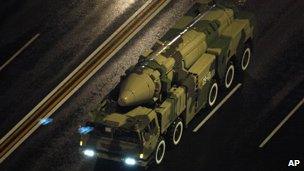 Chinese military vehicle carrying a DF21 medium range ballistic missile is on its way to a military parade rehearsal for the 60th anniversary of the founding of the People's Republic held in Beijing, China, September 6, 2009