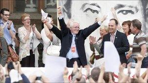 Relatives of those shot dead on Bloody Sunday celebrate outside the Guildhall in Londonderry