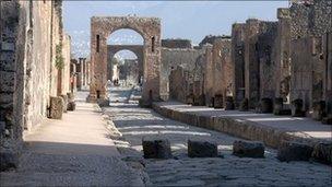 A street in Pompeii which, like Herculaneum, was covered by a volcanic eruption in 79AD