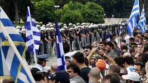 Greek protesters face police in Athens, 15 Jun 11