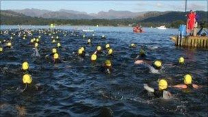 Thousands of swimmers take to Windermere