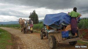 Kachin people fleeing fighting near the Chinese border, Burma