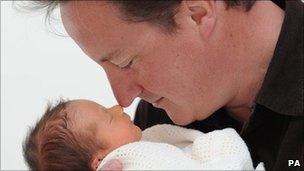 David Cameron with his new born daughter Florence