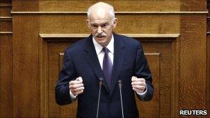 Prime Minister George Papandreou addresses a session of the parliament in Athens on 19 June