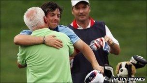 Rory McIlroy celebrates his US Open win with his father Gerry