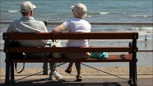 Elderly couple by a beach