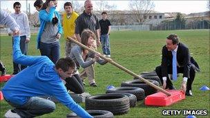 David Cameron and teenagers on a team-building course (April 2010)