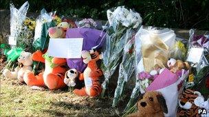 Floral tributes at crash scene