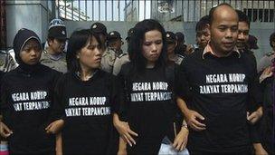 Protest outside the Saudi embassy in Jakarta. the t-shirts read: corrupt government, workers are beheaded