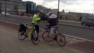 Cyclist getting a ticket