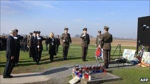 Serbian President Boris Tadic pays tribute at the Ovcara memorial to some 200 Croat prisoners killed by Serb forces (4 November 2010)