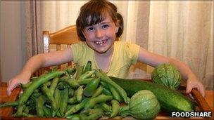 Child with Foodshare vegetables