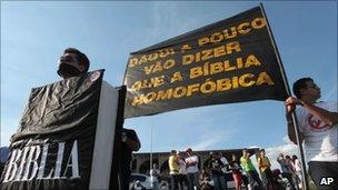 People belonging to several different religious groups, protest in Brasilia against same-sex civil unions with a banner that reads: "Pretty soon people will say the Bible is homophobic." - 1 June 2011