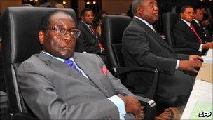 Zimbabwe's President Robert Mugabe (C) attends the opening session of a Sadc summit on 20 May 2011