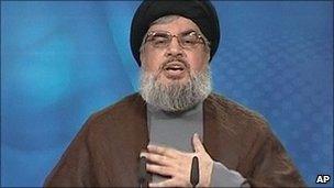 Hezbollah leader Hassan Nasrallah gestures as he delivers a message broadcast on 24 June, 2011