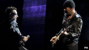 Bono and The Edge perform