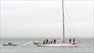 Gypsy Moth VI with damaged sail