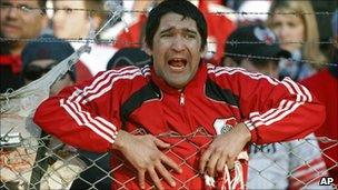 River Plate fan watches the match against Belgrano in Buenos Aires, Argentina, Sunday, June 26, 2011