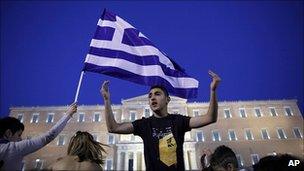 Protester outside parliament in Athens 26 June 2011