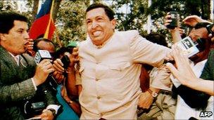 Hugo Chavez greeted by crowds