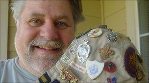 Simon Ball with his Blue Peter badge