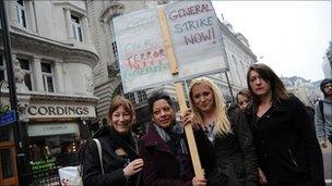 Demonstrators against the coalition government's spending cuts march in London on Saturday 26 March