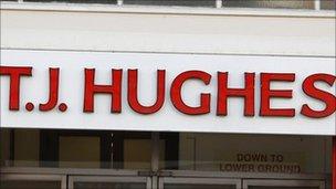 TJ Hughes sign