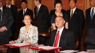 Professor Sir Martin Sweeting, Chairman, Surrey Satellite Technology Ltd and Wu Shuang, Chairman, 21st Century Aerospace Technology sign a Cooperation Agreement for a Remote Sensing Satellite Constellation