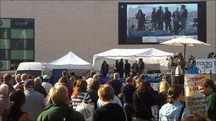 Pentecost event in front of the big screen