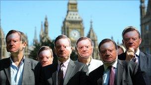 People in Ken Clarke masks