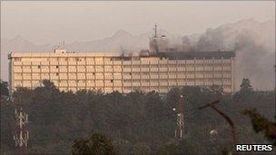 Smoke billows from the Intercontinental hotel during a battle between Afghan security forces and suicide bombers and Taliban insurgents in Kabul June 29, 2011.