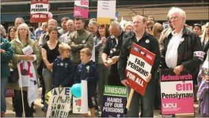 Union members take part in a rally in Wrexham town centre