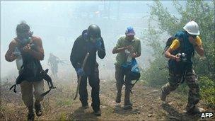 Demonstrators protest against a planned high-speed rail line running through the Susa valley are on 3 July.