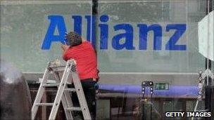 Man fixing Allianz sign