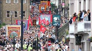 Banners and people in Durham