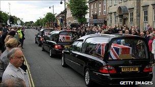 Crowds line the streets in Wootton Bassett to pay their respects