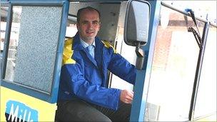 Graham Smith in a Kirby & West milkfloat