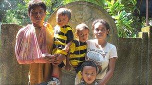 Yetriana and Mulyono Lopez with their three children