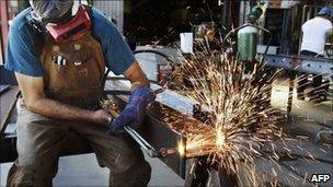 Man cutting steel