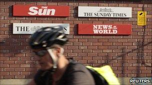 Signs for the Sun, the Times, Sunday Times and News of the World